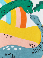 Detail view of green and gray dinosaurs facing each other under a rainbow on a white children's tee