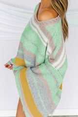 Suéter de cuello barco con hombros caídos y rayas en contraste