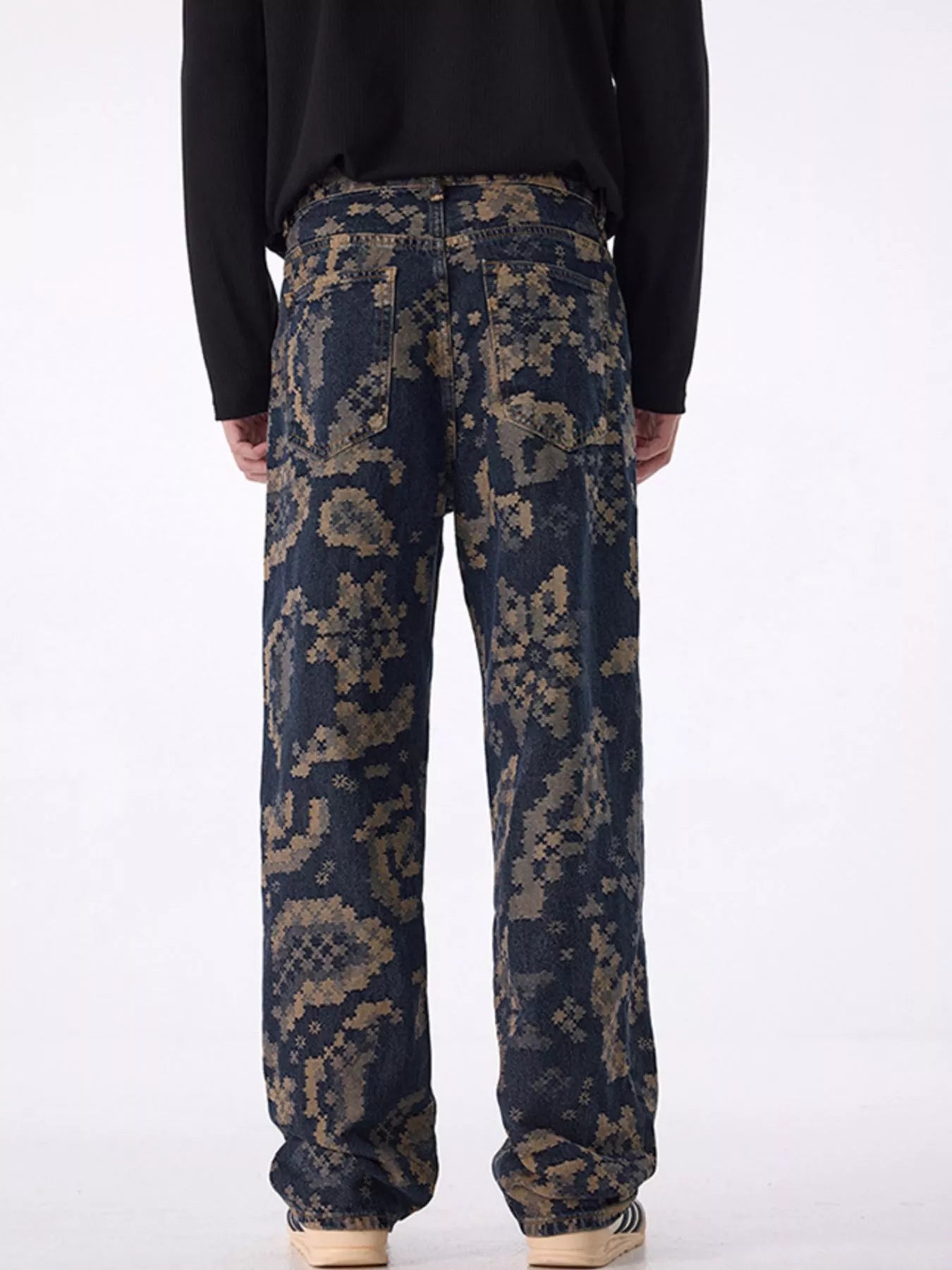 Men's printed wide leg cargo pants with pockets.