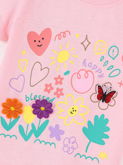 Close-up of colorful cartoon print on pink children's t-shirt, with hearts, sun, flowers and butterfly