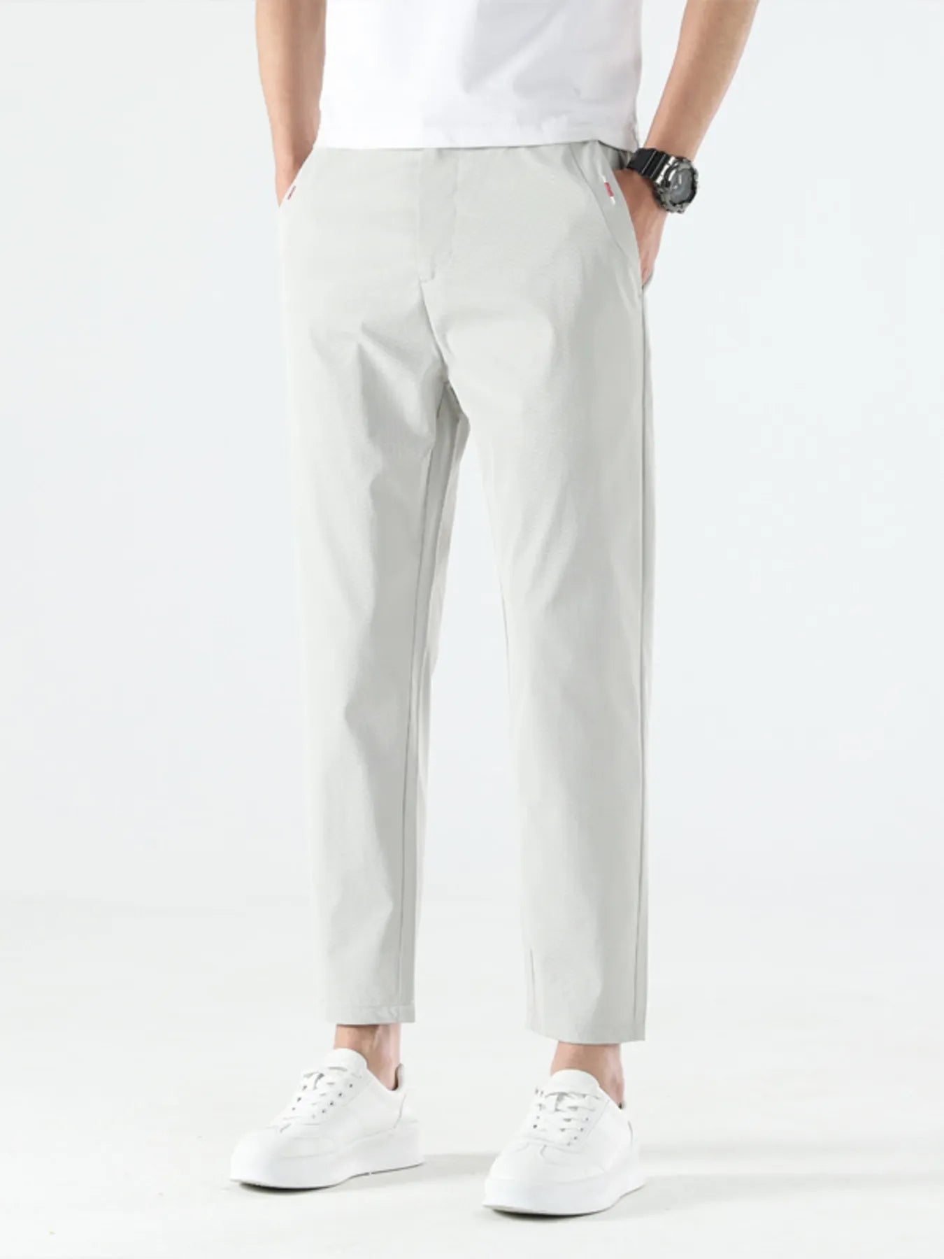 Men's straight leg casual pants with pockets, product view.