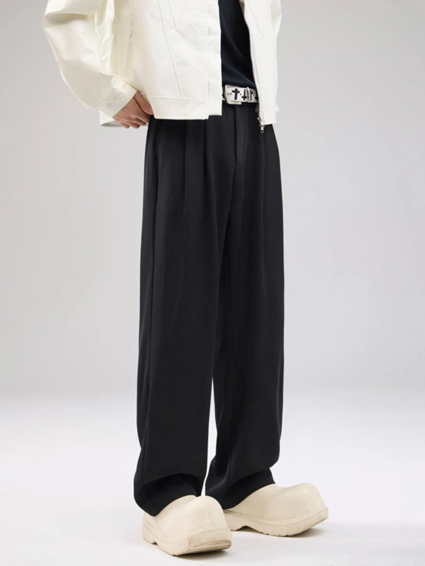 Men's wide leg pants with a drawstring waist and pockets.