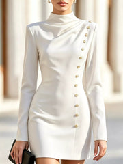 Model outdoors wearing white mock neck mini dress with long sleeves and gold decorative buttons