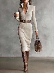 Front view of a beige ribbed knit turtleneck bodycon sweater dress with a belt and boots