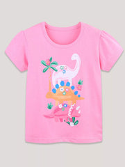 Pink children's short sleeve t-shirt laid flat with stacked dinosaurs flowers and palm tree
