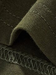 Close-up of the army green sleeve hem and stitching detail on a children's T-shirt