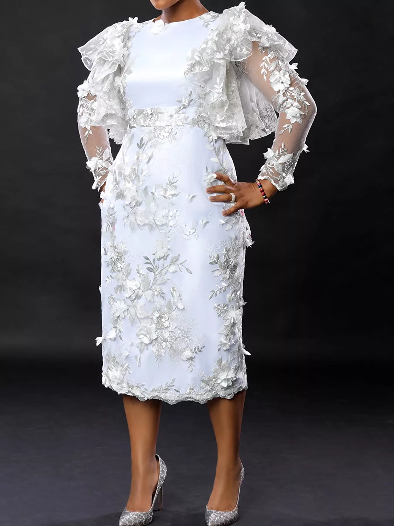Model wearing white plus size floral embroidered sheer ruffle sleeve midi dress