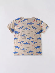 Back view of tan children's crew neck tee with all over blue shark print