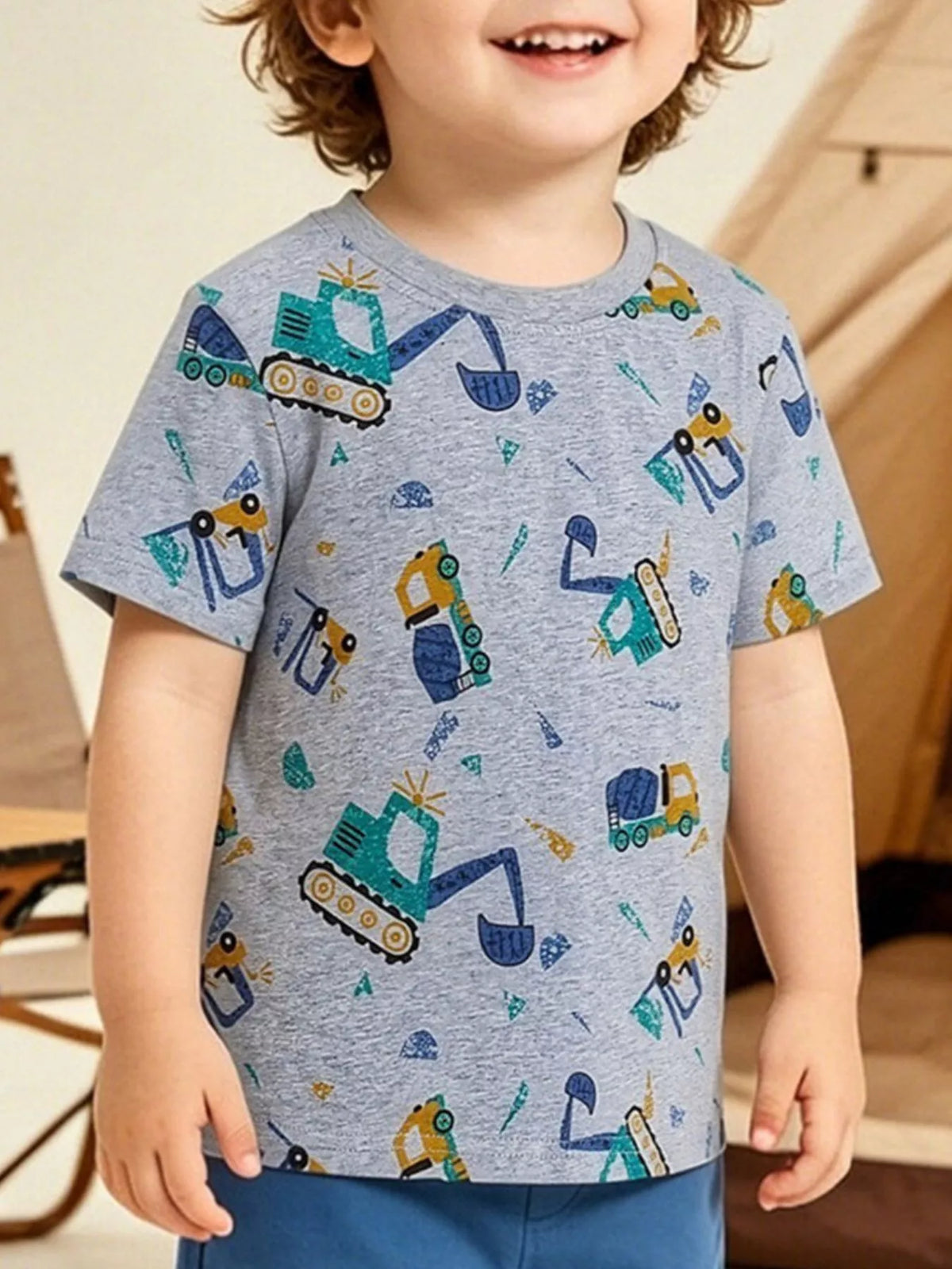 Children's gray short sleeve tee with colorful excavator and truck print, front view