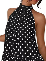 Close view of the black polka dot halter neck bodice and gathered neckline