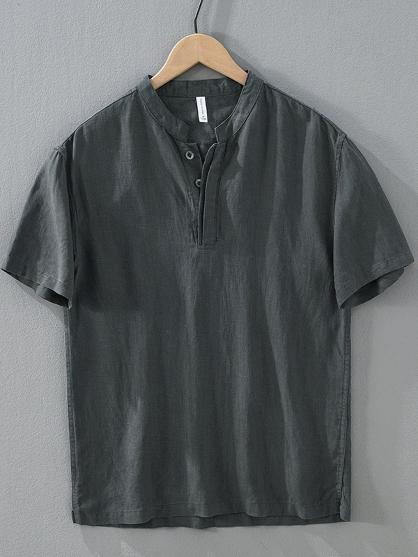 Men's casual short-sleeve shirt with a buttoned front.