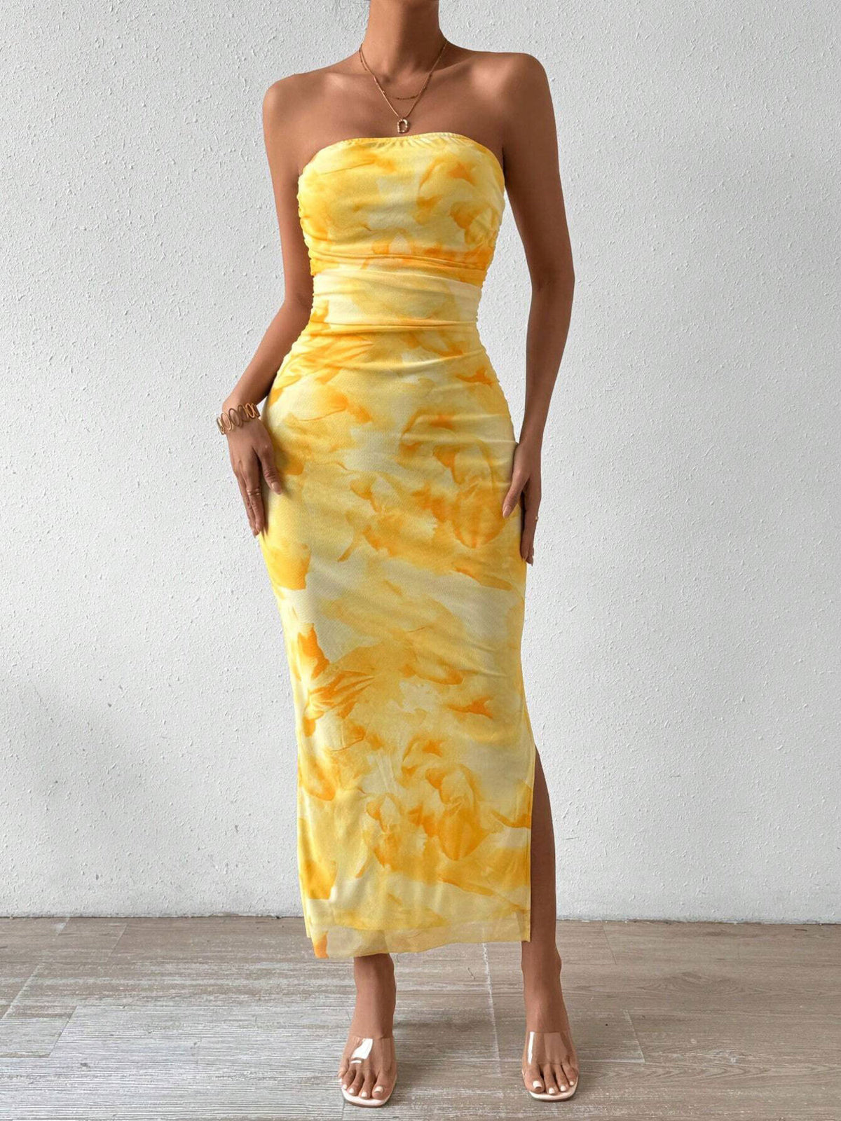 Yellow ruched strapless bodycon midi dress with side slit, front view