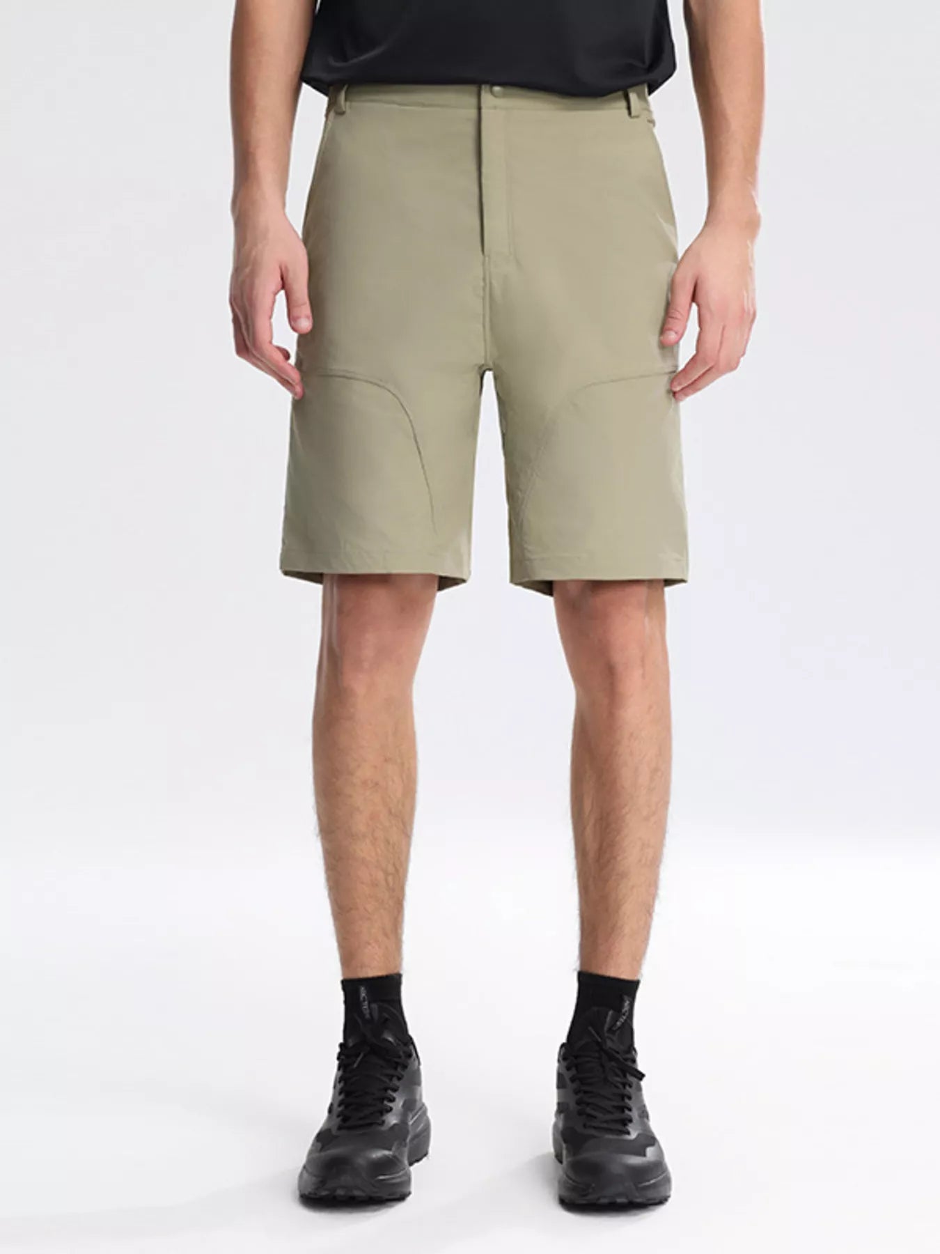 Men's light green lightweight casual shorts with pockets.