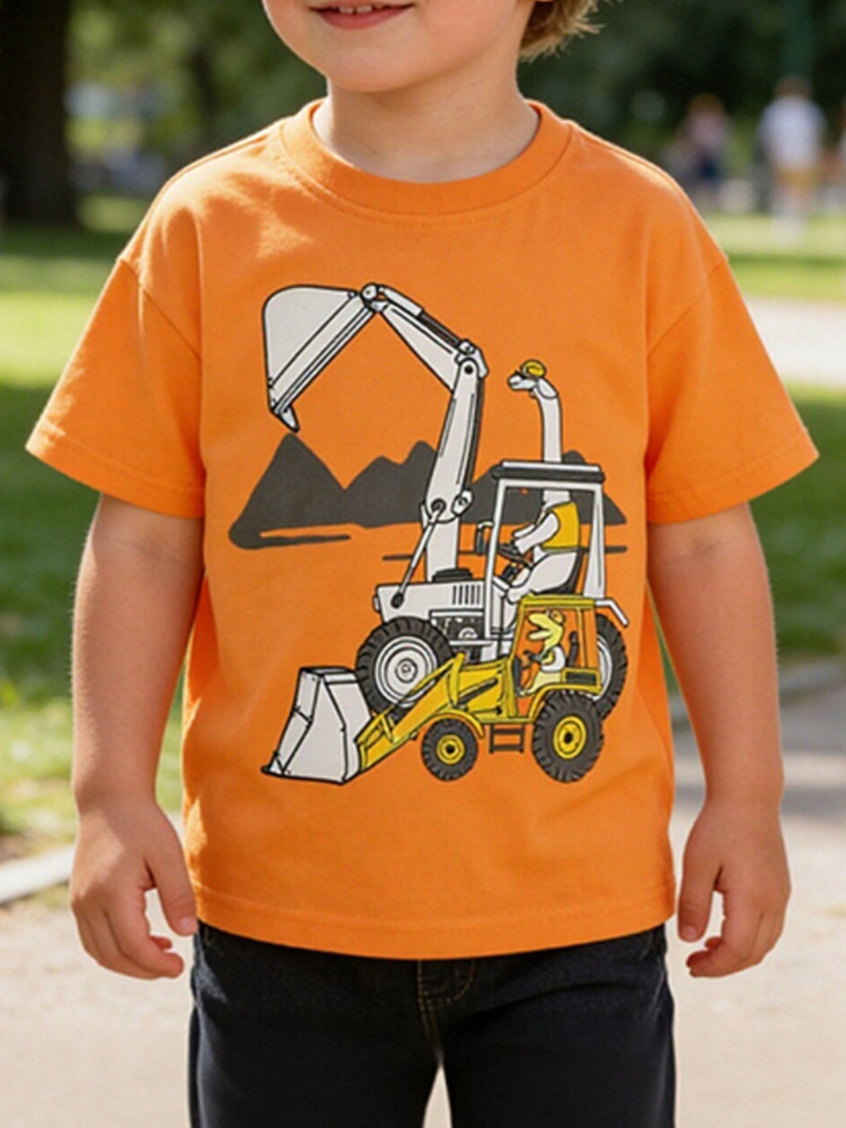Children's orange short sleeve T-shirt with a cartoon excavator graphic, shown worn in front view
