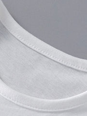 Close view of the white round neckline stitching on the children's unicorn tee