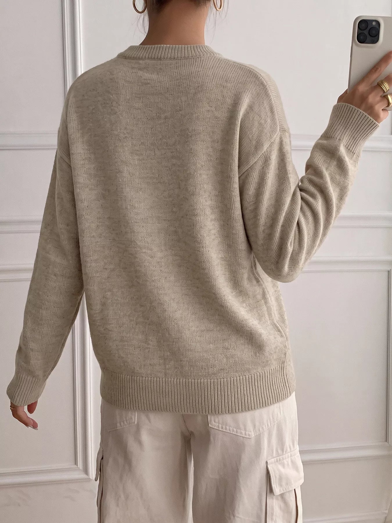 Back view of khaki dropped shoulder long sleeve sweater with ribbed hem