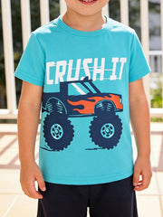 Front view of a children's pastel blue short sleeve t-shirt with a large flame monster truck graphic