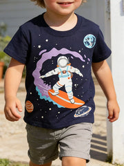 Children's blue crew-neck T-shirt featuring an astronaut surfing graphic.