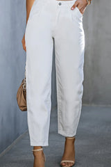 Women's white high-waisted straight-leg jeans in a non-stretch cotton blend.