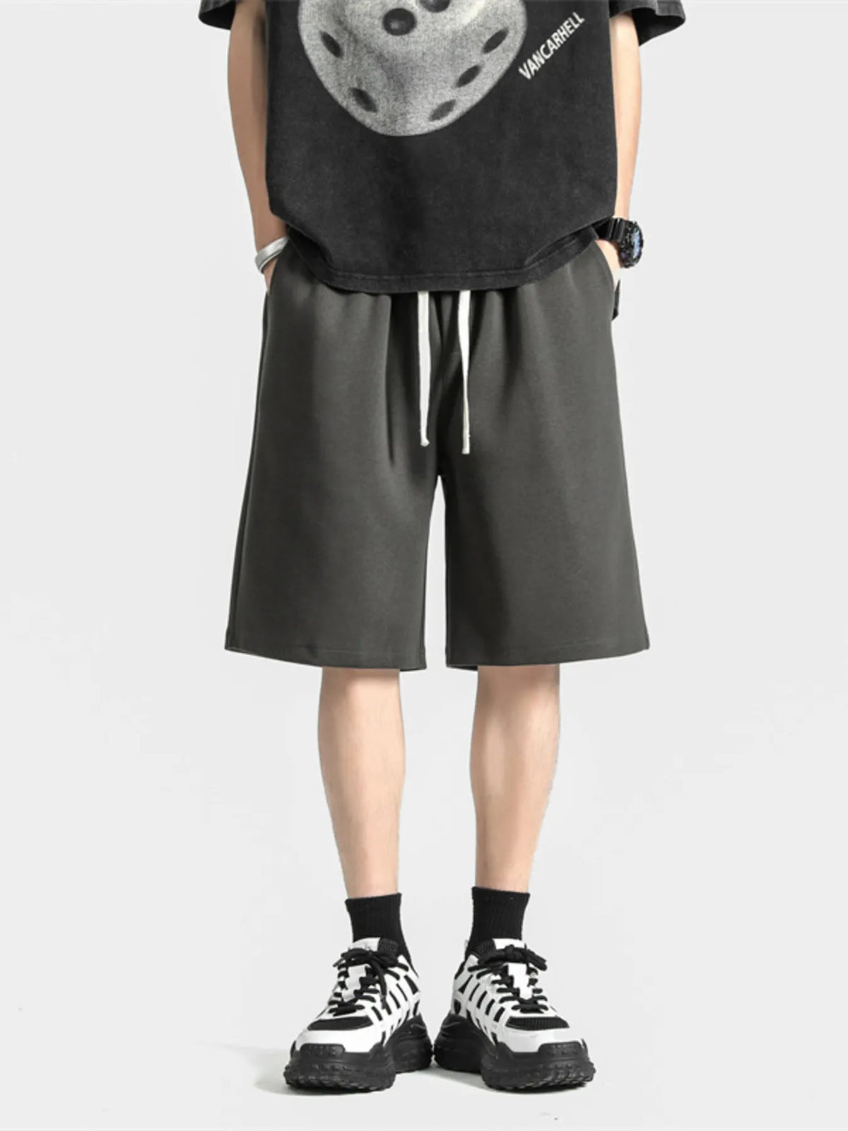 Men's dark gray loose-fit casual shorts with a drawstring waist.
