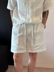 Men's apricot lightweight casual shorts with pockets.