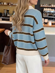 Back view of light blue striped polo sweater with cream ribbed hem and cuffs.