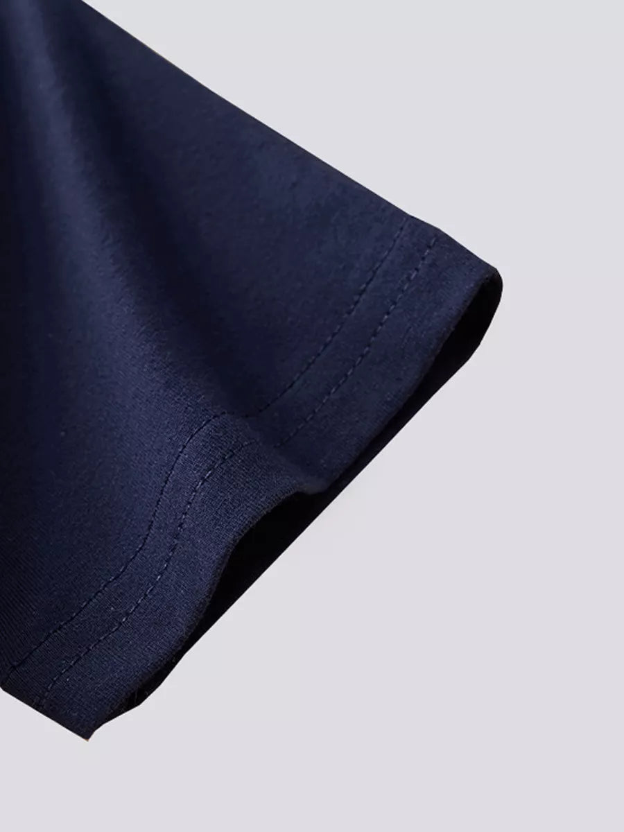 Close up of the navy short sleeve hem with double stitching on the T-shirt