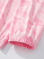 Close view of the elastic sleeve cuff on the blush pink camouflage children's jacket