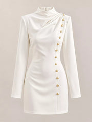 Ghost mannequin front view of white mock neck mini dress with gold decorative buttons and long sleeves