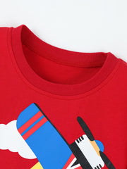 Close-up of red children's t-shirt crew neckline and stitching, with airplane graphic below