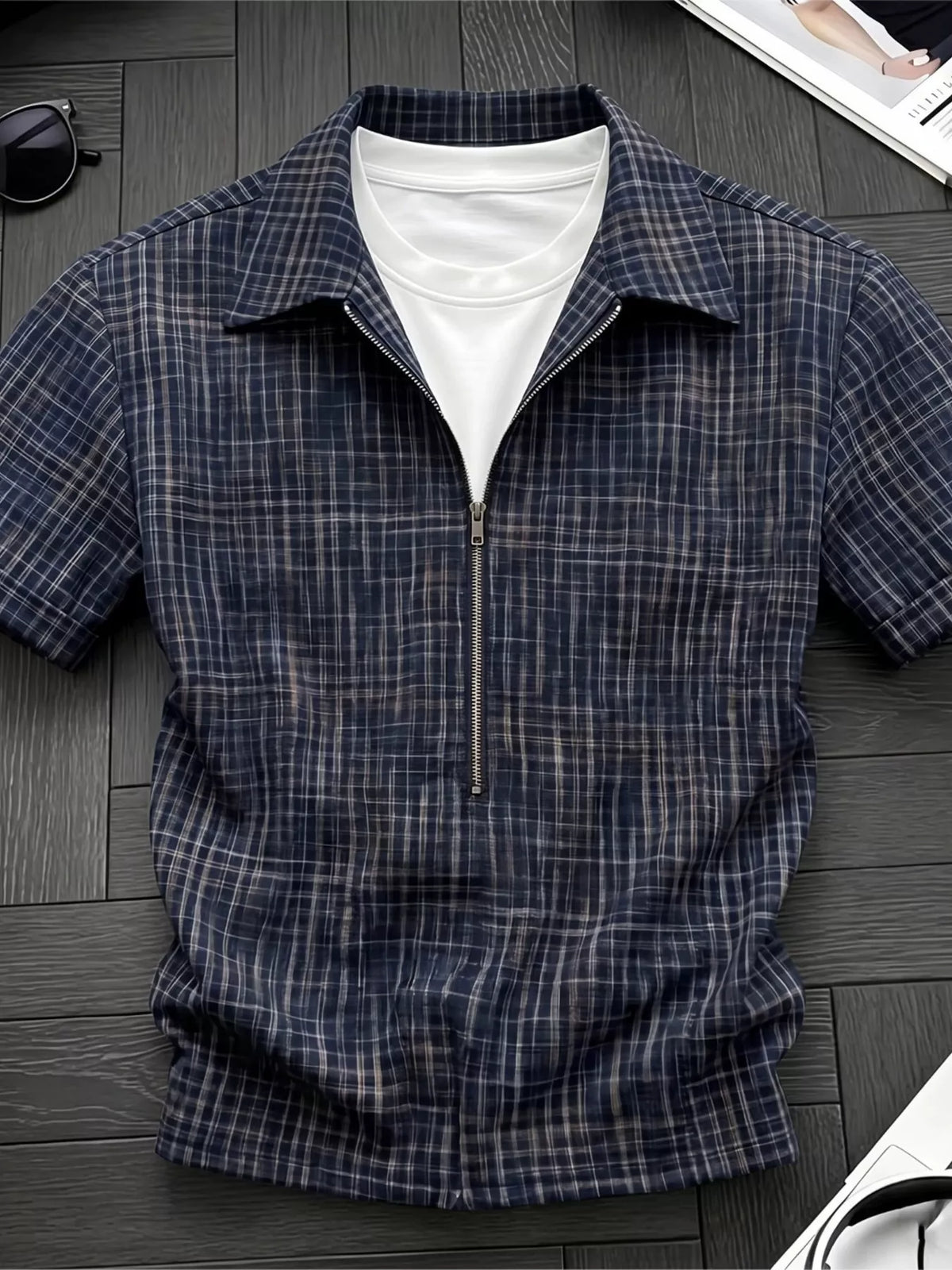 Men's plaid short-sleeve shirt with zipper detailing, made from polyester.