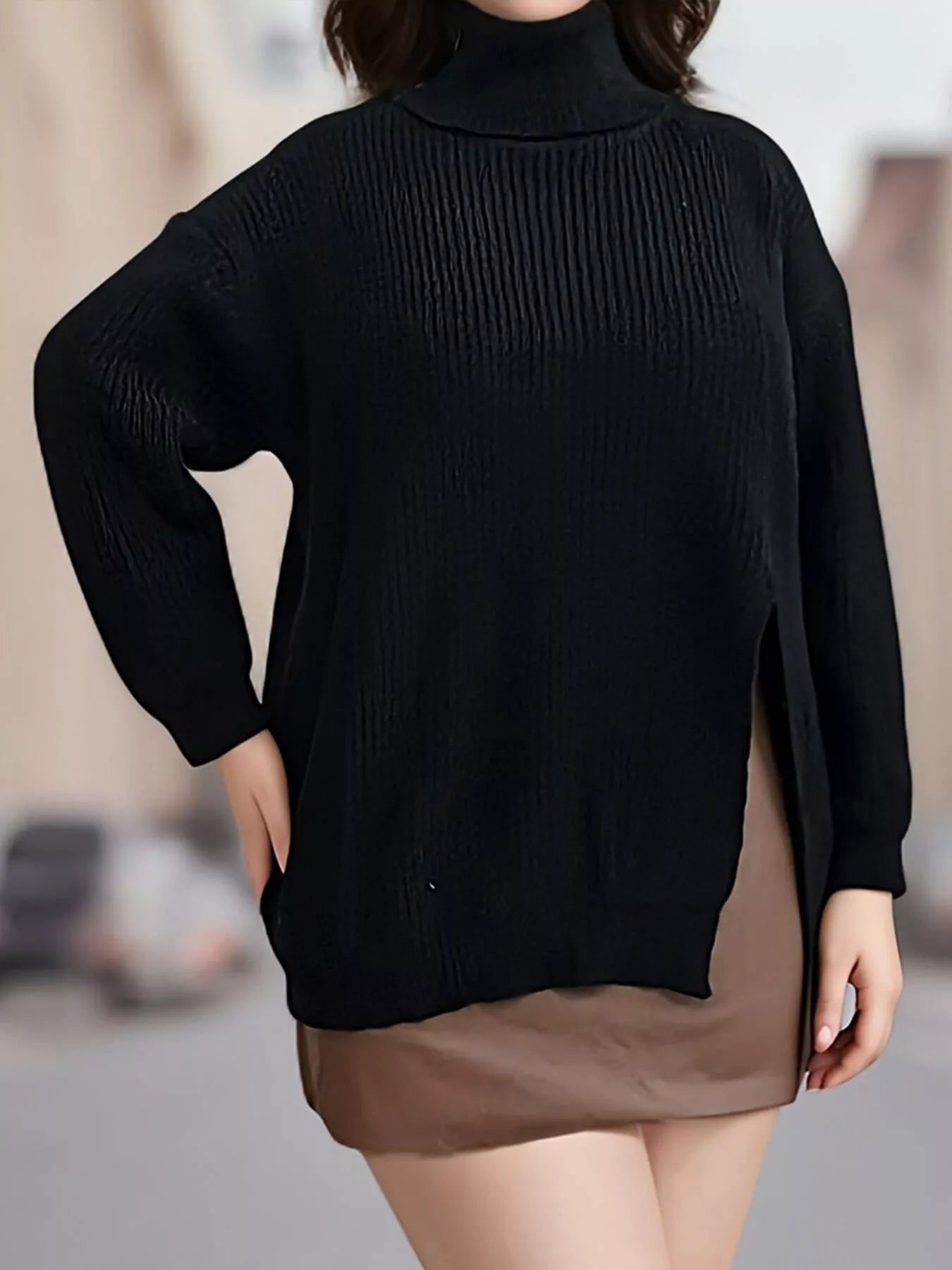Front view of black ribbed turtleneck sweater with long sleeves