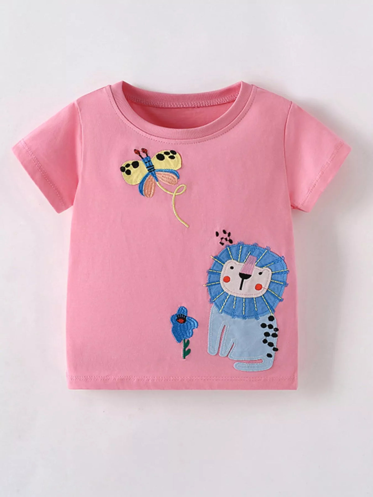 Front view of a pink children's short sleeve shirt with embroidered lion, butterfly, and flower