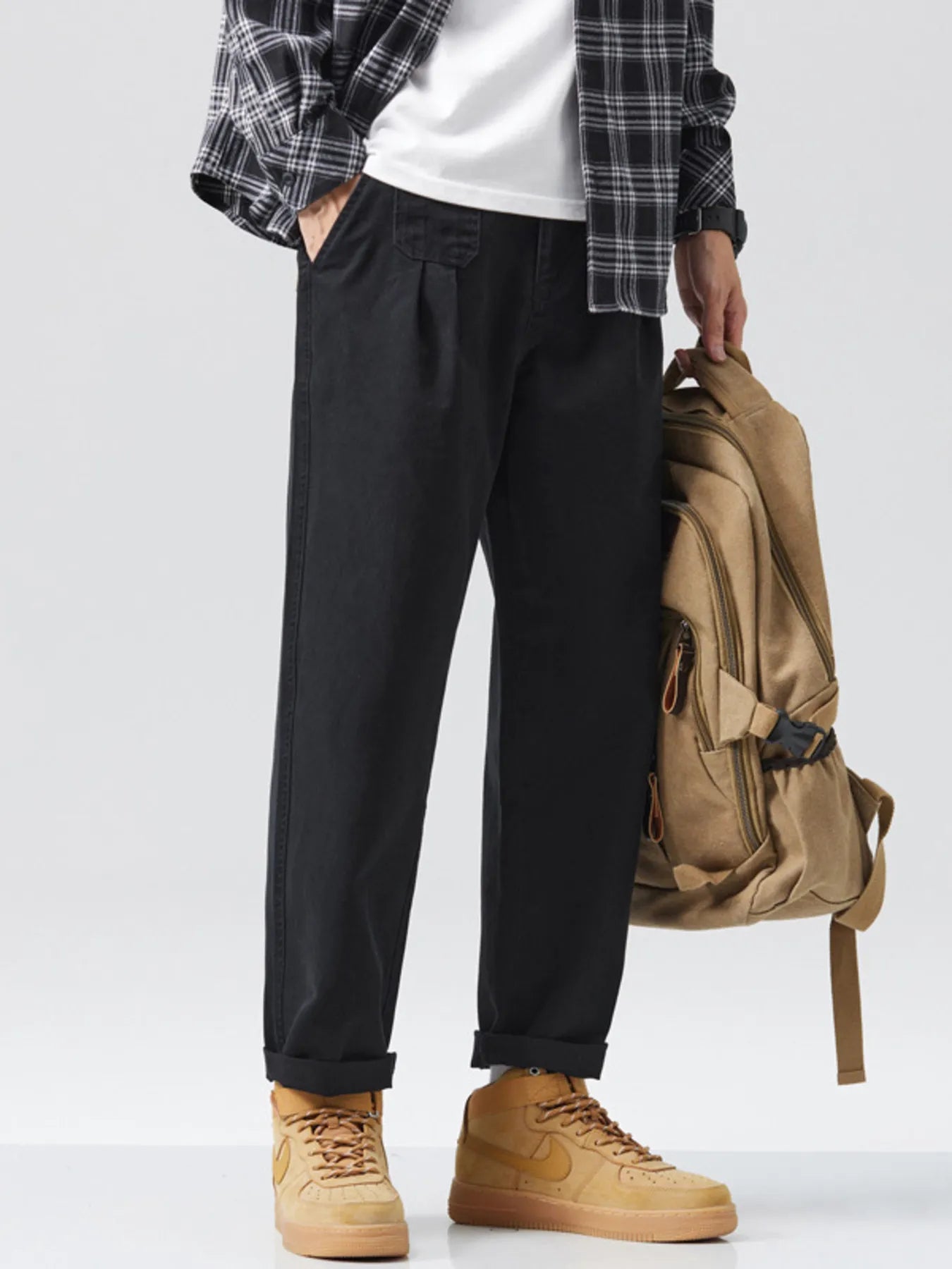Men's loose fit pants with a drawstring waist.