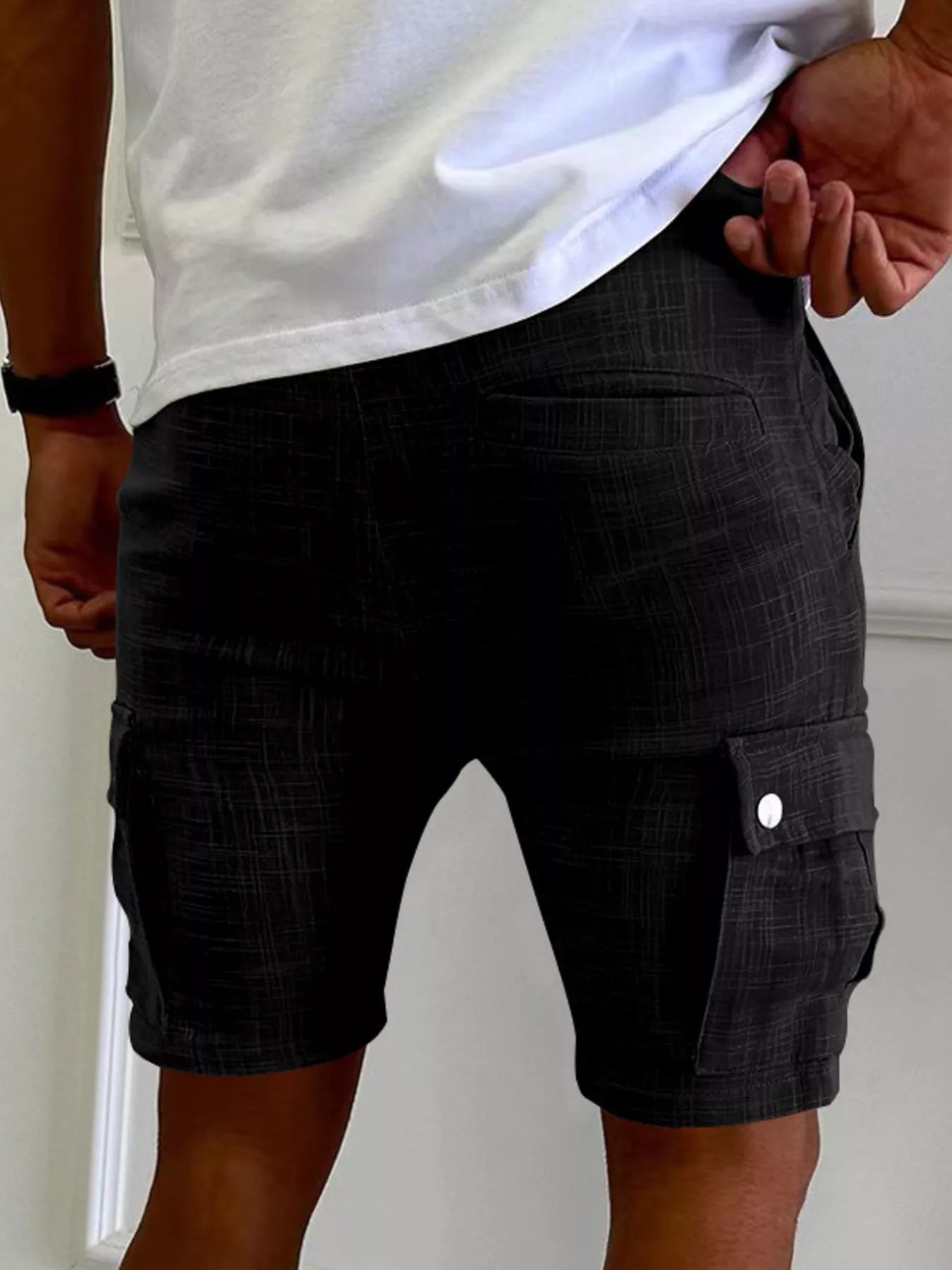 Men's casual cargo shorts with a drawstring waist and pockets.