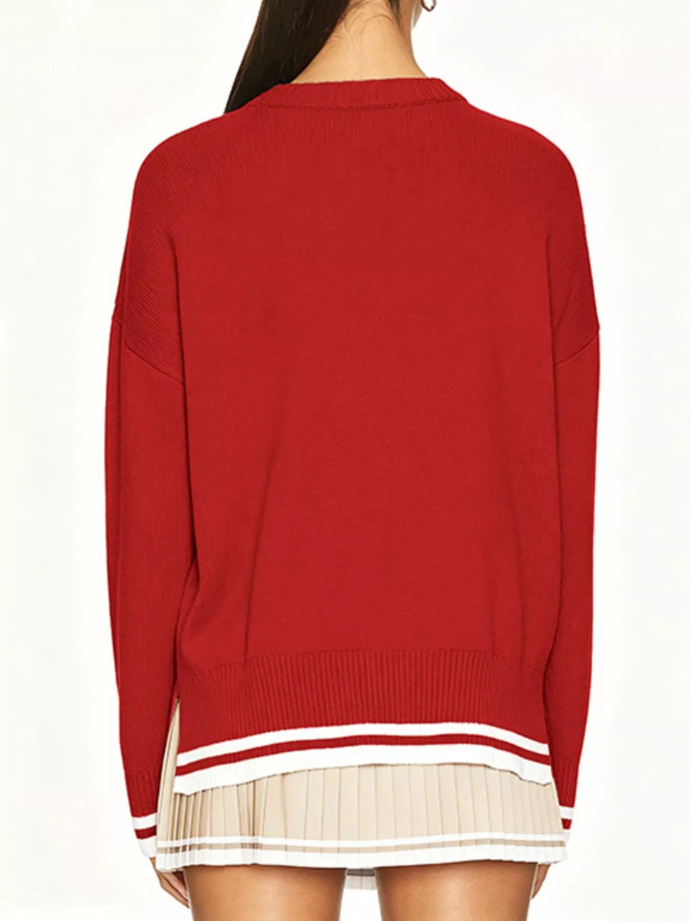 Back view of the red dropped shoulder sweater with plain back and striped hem and cuffs.