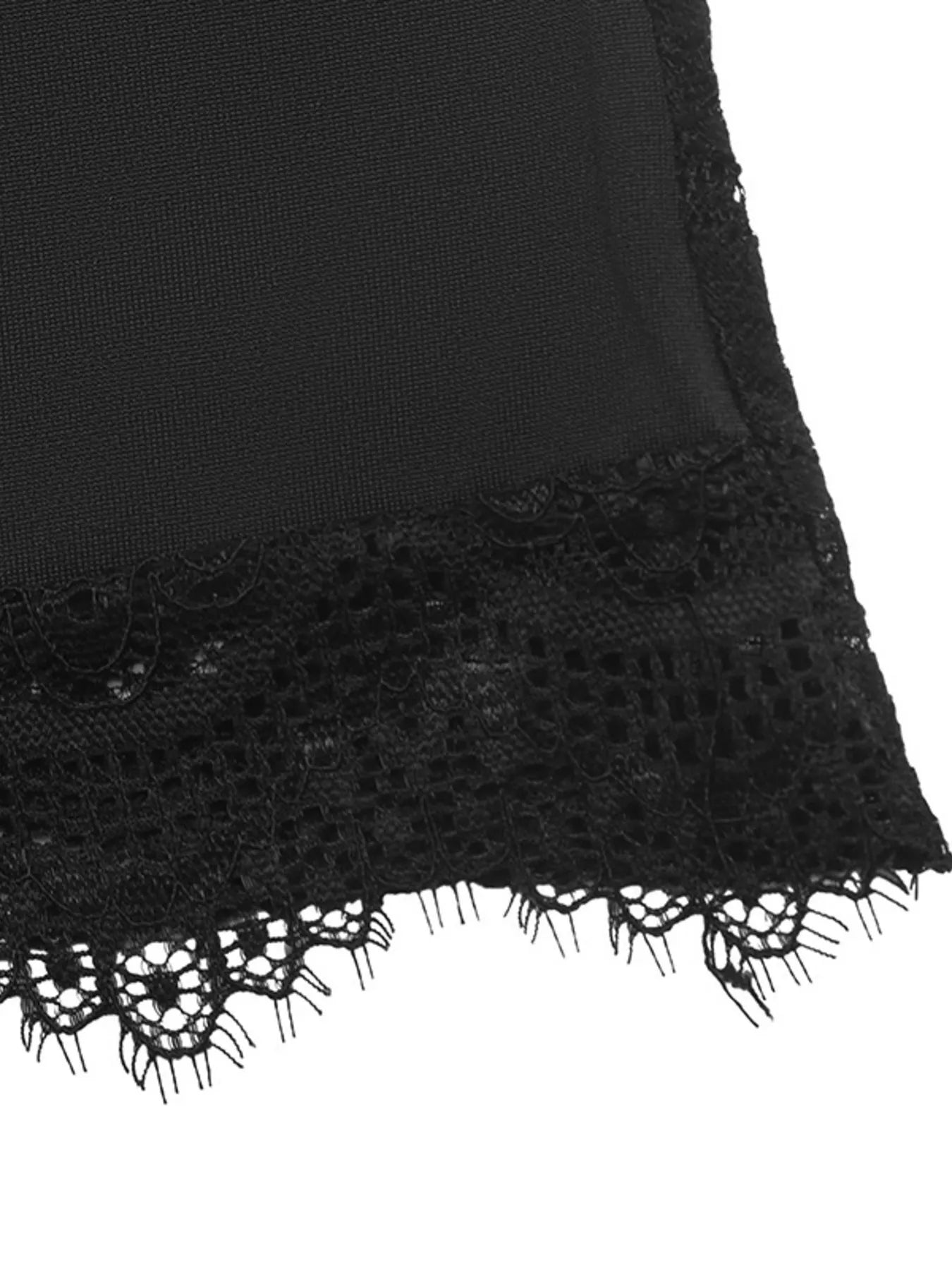 Close-up detail of black lace sleeve fabric and scalloped lace trim on a square neck top