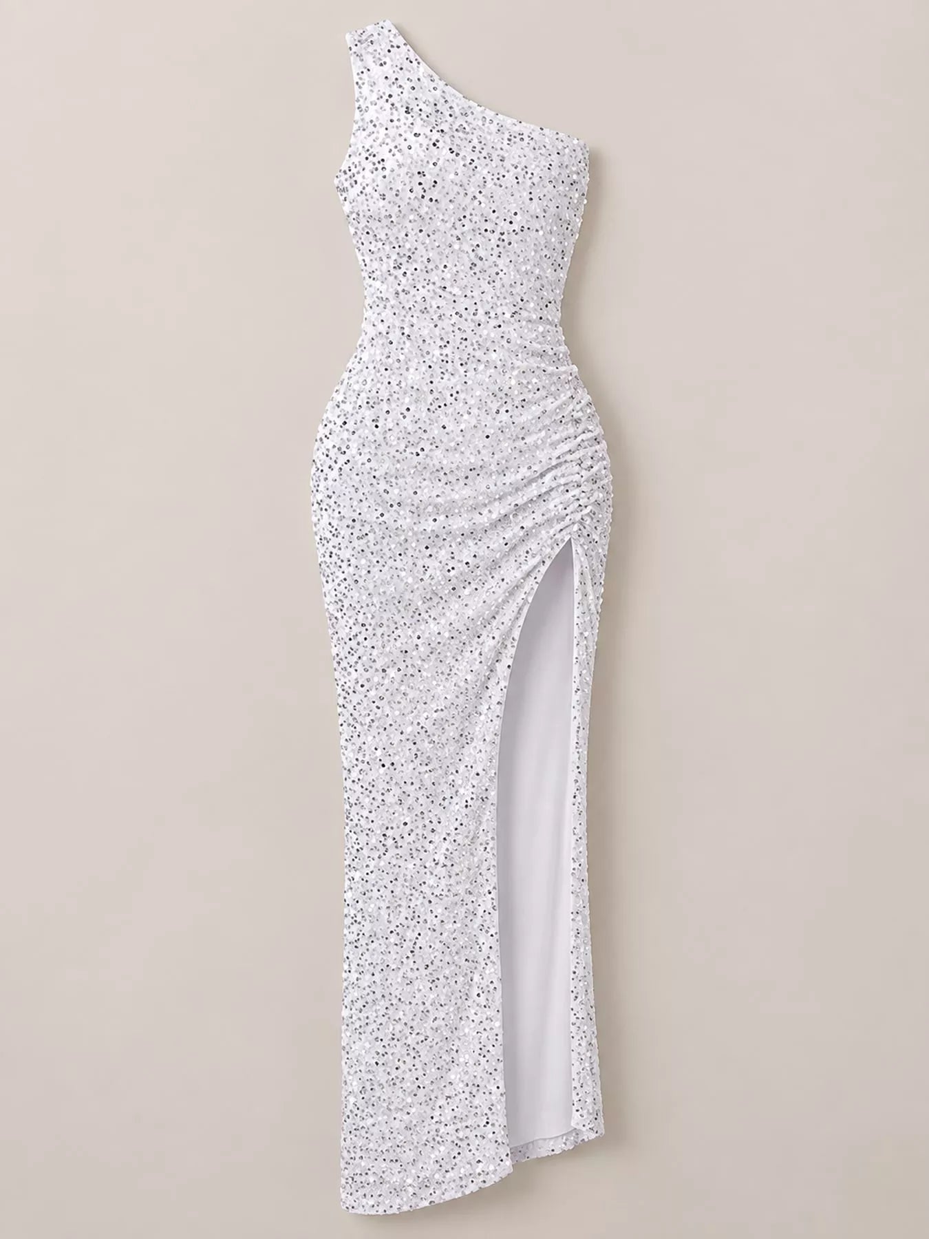 White sequin one shoulder evening dress shown flat front facing with a high slit