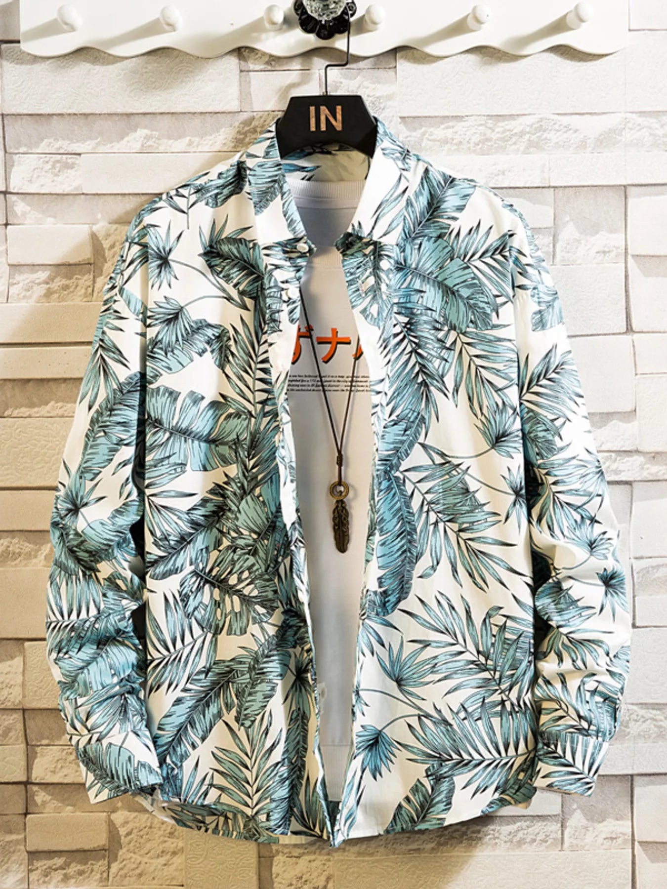 Men's printed button-up shirt made from a cotton-spandex blend.