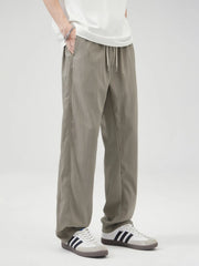 Men's casual wide leg pants with a drawstring waist.