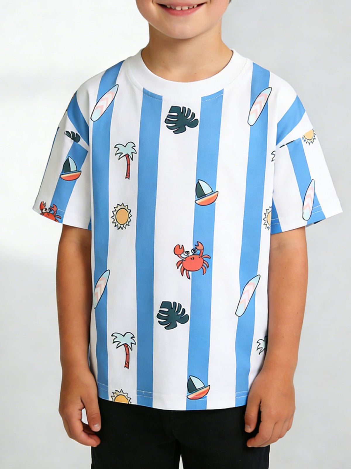 Children's white and blue striped tee with crab palm sailboat and surfboard prints front view