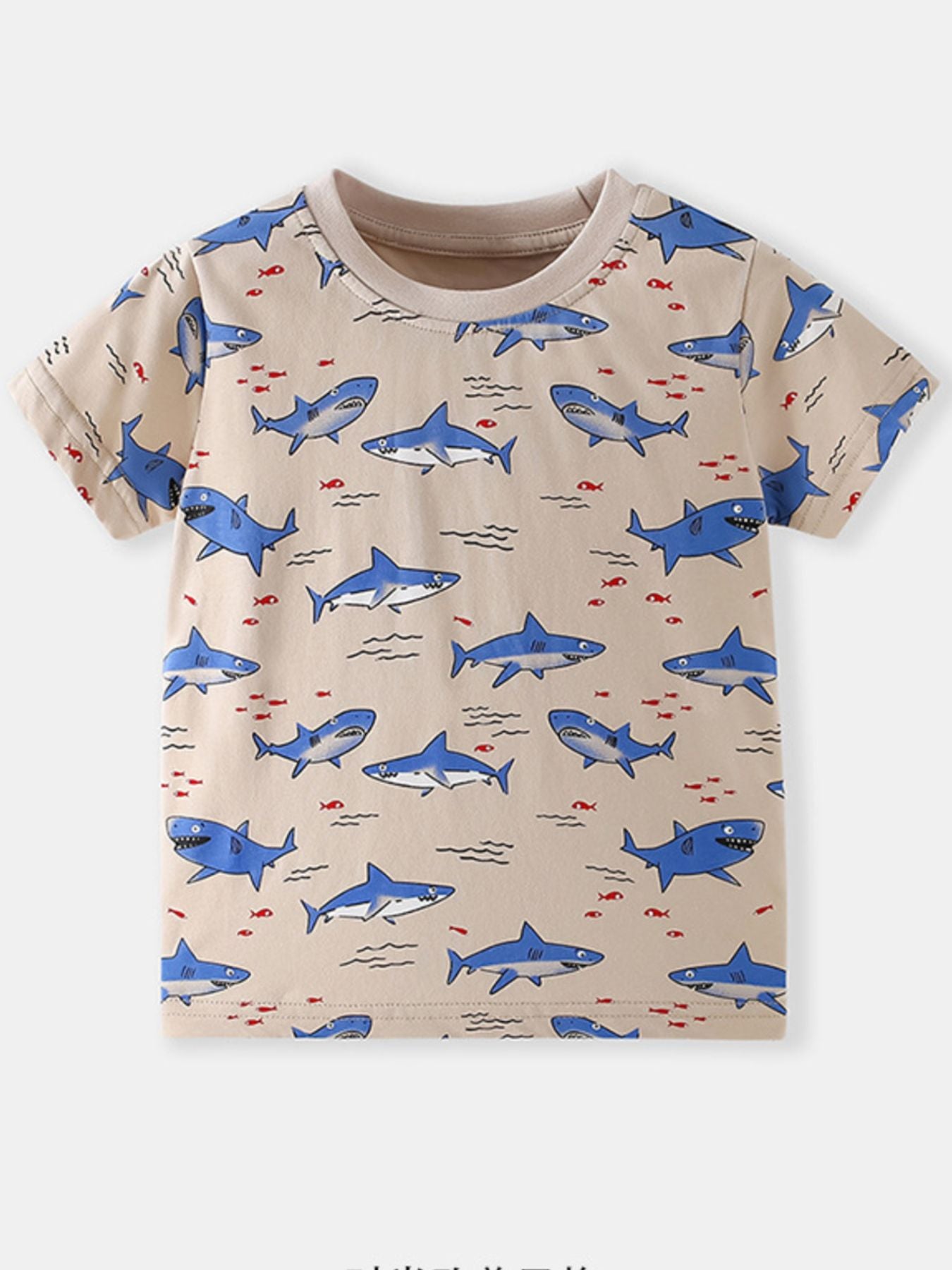 Flat lay front view of a children's gray crew neck t-shirt covered in blue shark print with tiny red fish