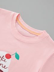 Close-up of the blush pink children's t-shirt neckline and the cherry on the ice cream graphic