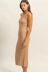 Side view of a taupe round neck bodycon ribbed knit dress worn on model