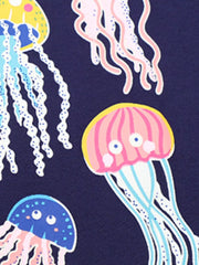 Close-up of pink and blue cartoon jellyfish print on black children's tee