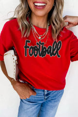 Front view of deep red game day t shirt with polka dot Football lettering worn with jeans