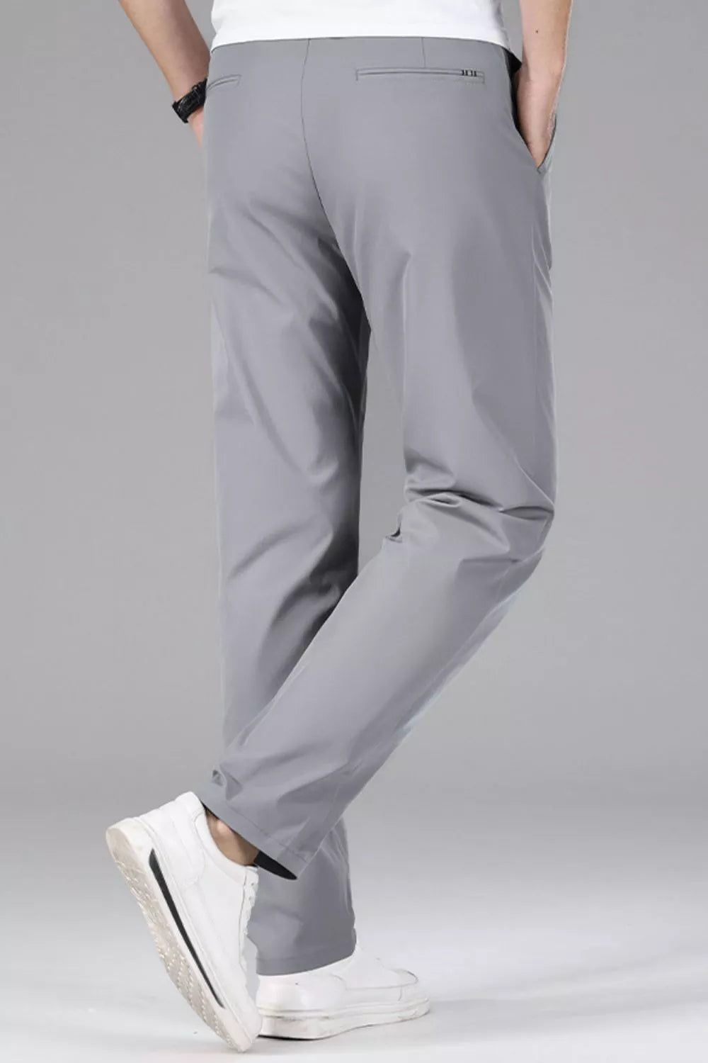 Men's slim-fit stretch dress pants with pockets.