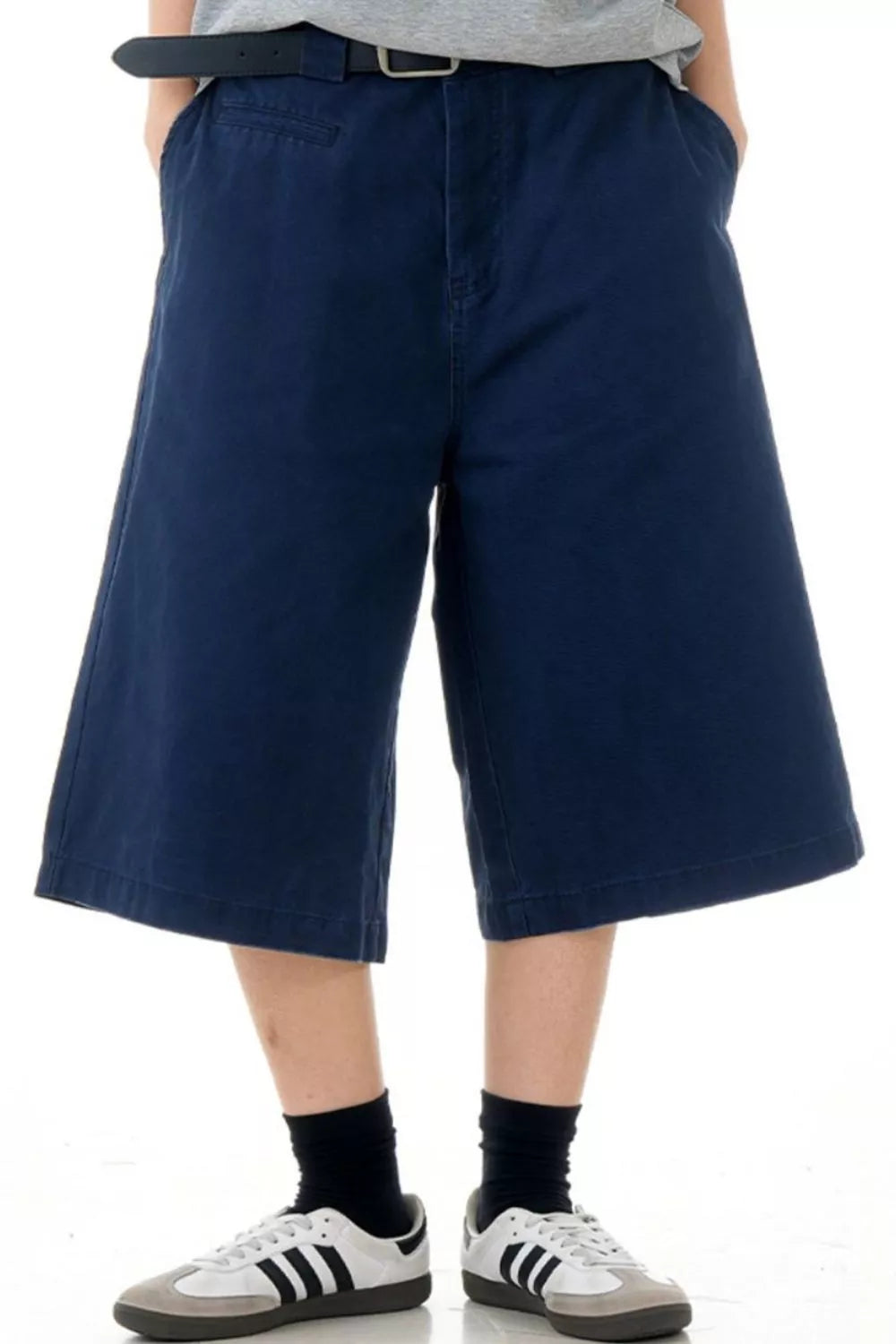 Men's navy blue wide-leg casual shorts with pockets.