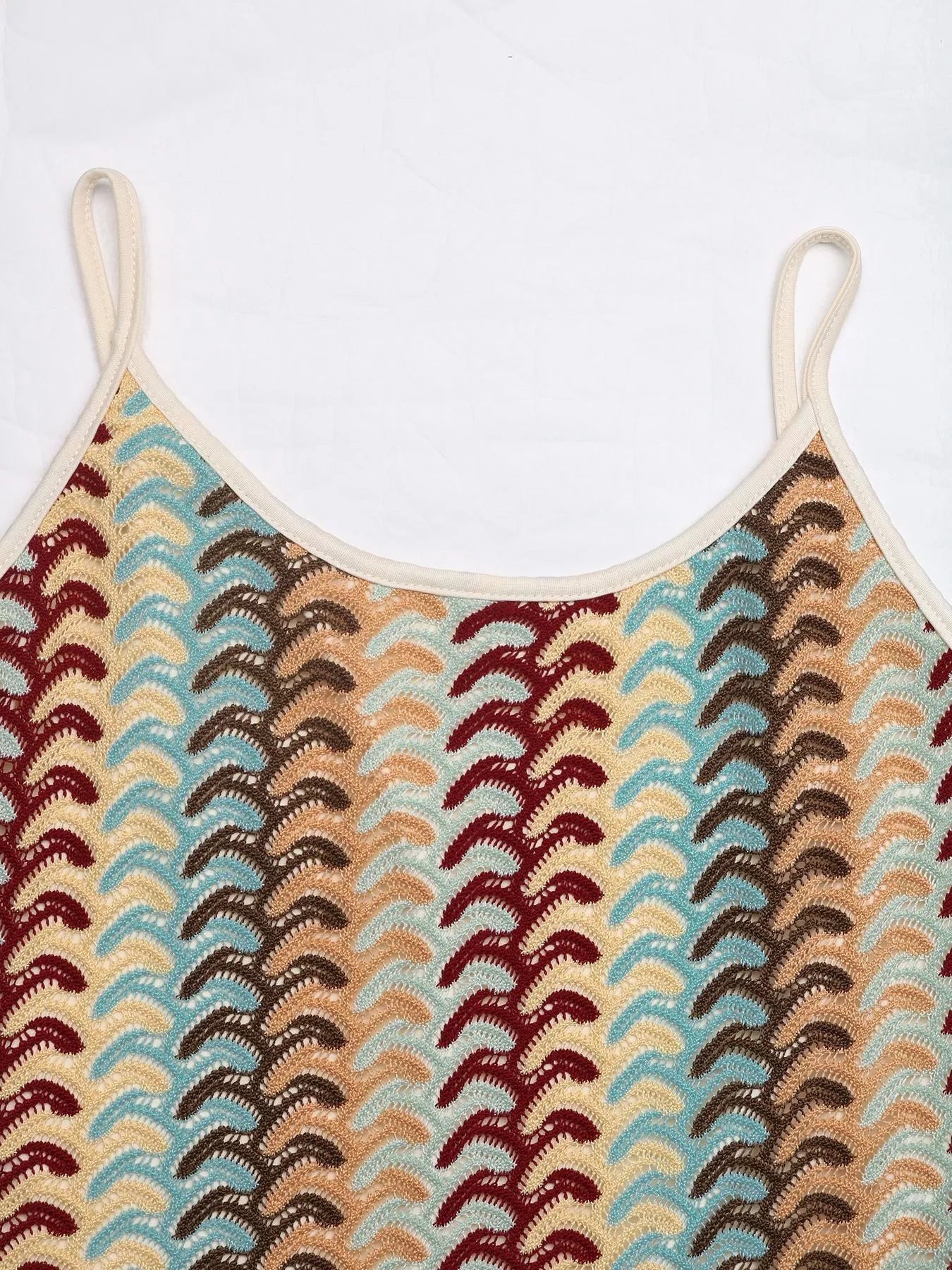 Flat close view of khaki striped scoop neckline and straps of midi dress