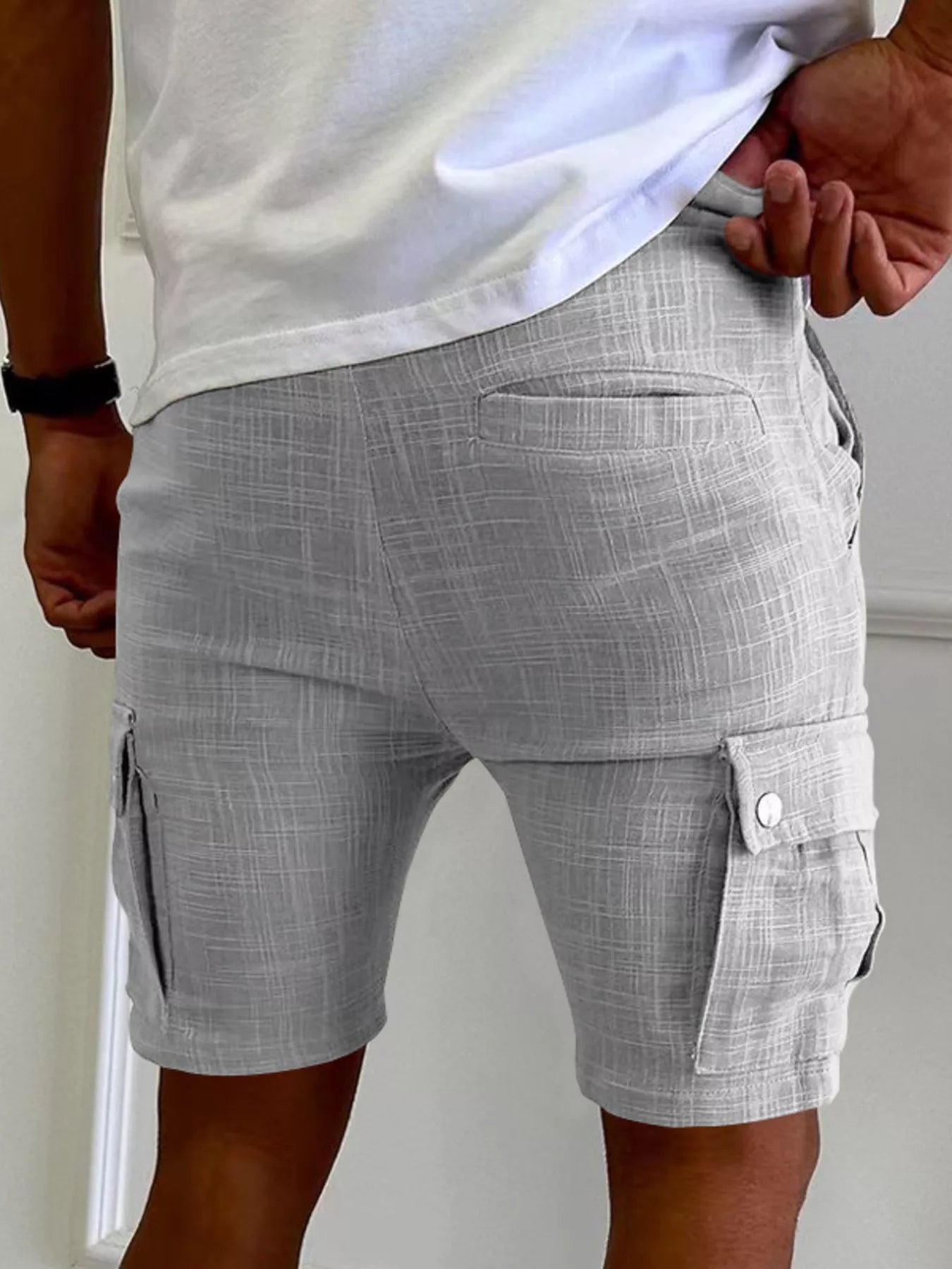 Men's casual cargo shorts with a drawstring waist and pockets.